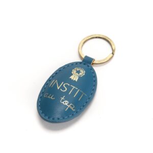 porte clé instit au top bleu